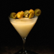 Velveta Martini, aka the Veltini, in a dramatic spotlight
